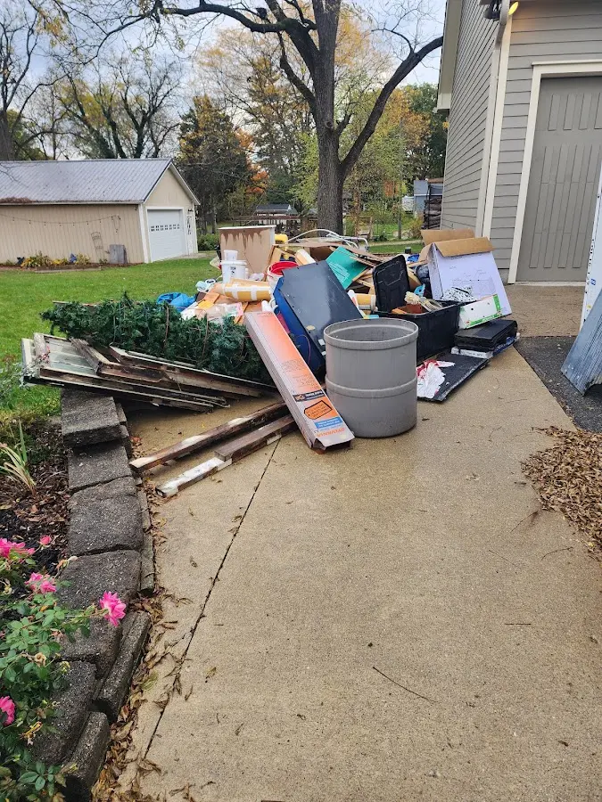 Dumpster being loaded with debris for Demolition Dumpster Rental in Whitpain